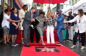 Gospel singer Shirley Caesar(Center-L) is assisted while stepping onto her Hollywood Walk of Fame star is unveiled on June 28, 2016 in Hollywood, California where she was the recipient of the 2,583rd star in the category of Recording. Ceasar has performed for the late Nelson Mandela and every US President since Jimmy Carter. / AFP / Frederic J. BROWN (Photo credit should read FREDERIC J. BROWN/AFP/Getty Images)